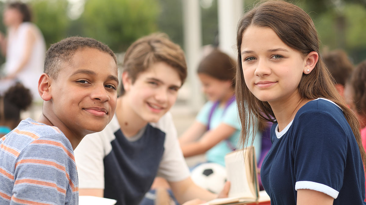 Adolescents Group of smiling adolescents outdoors